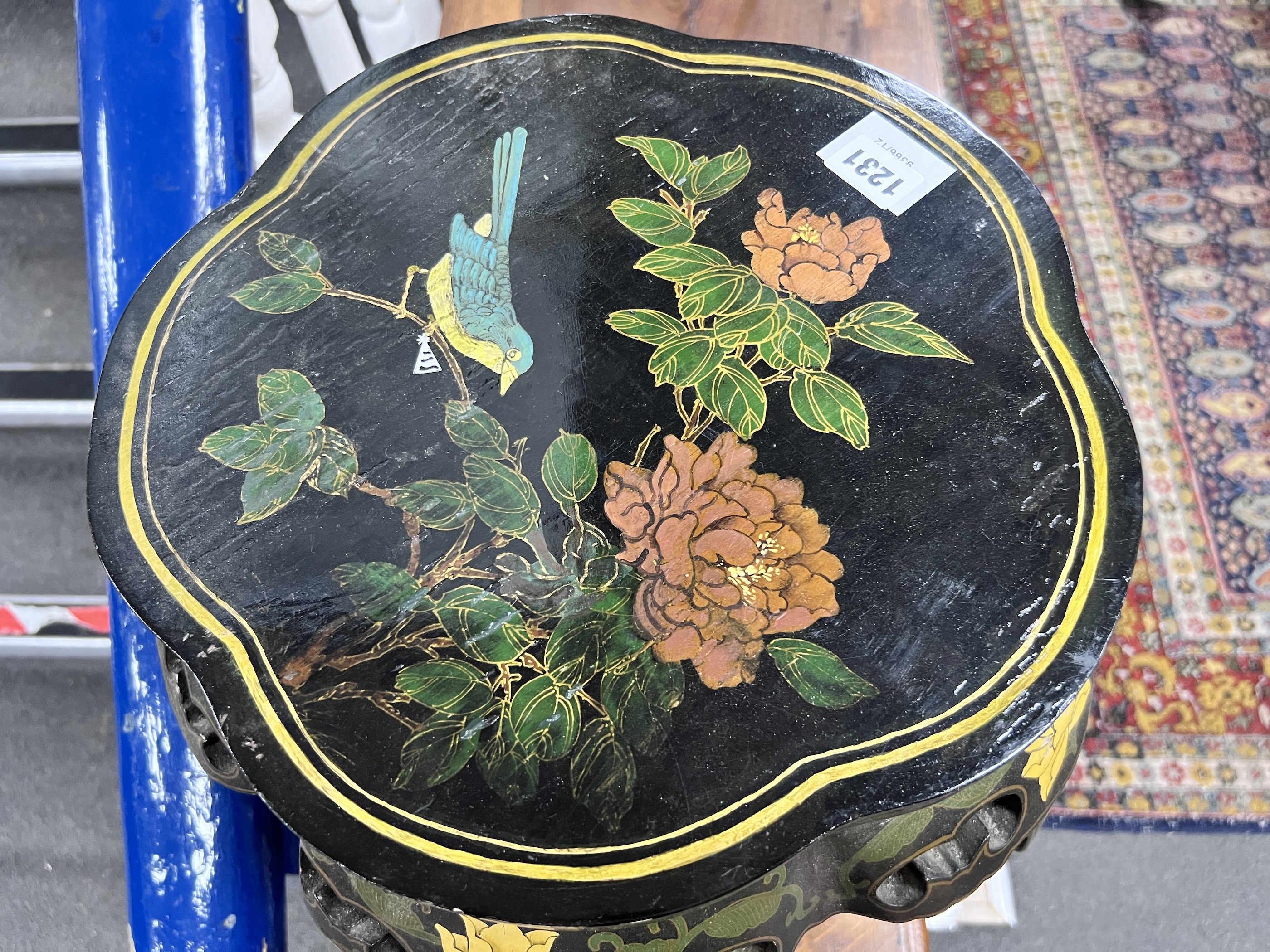 A Chinese decorated black lacquer vase stand, height 45cm